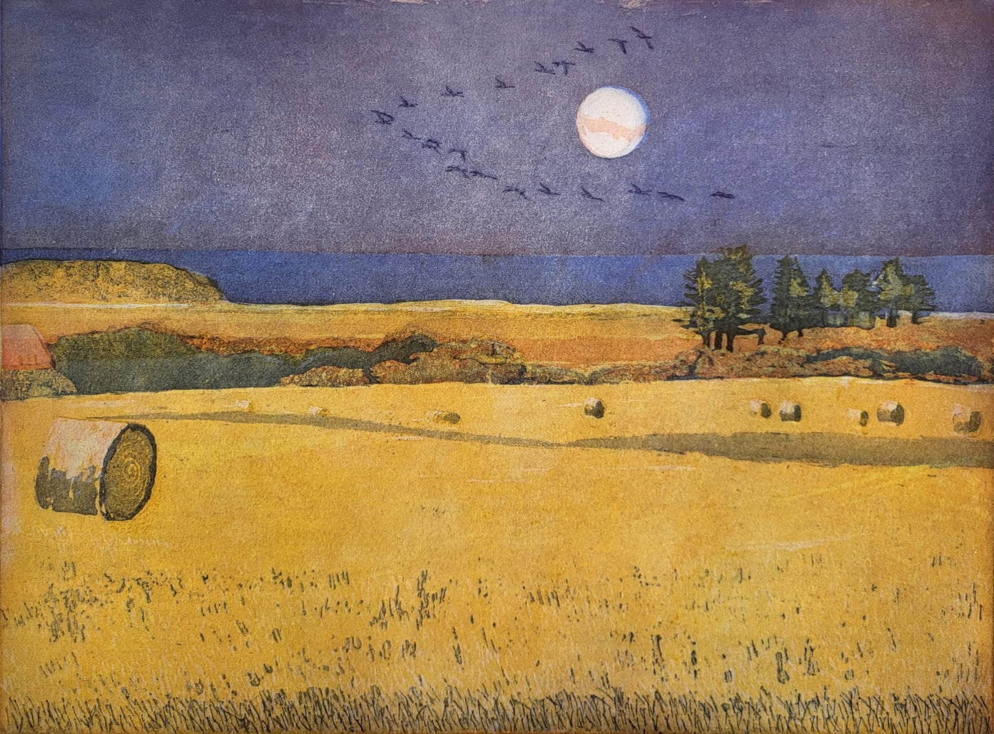 Harvest moon over fields Cley Norfolk